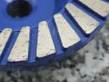 Dinosaw machine showing Engineered with aggressive segment designs for maximum grinding speed, reducing your project time significantly.