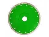 Dinosaw Machine mostrando canaletas no aro Turbo que direcionam fluxo de ar/refrigerante e removem resíduos para manter corte rápido a seco ou úmido.