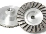 Dinosaw machine showing Our advanced metal bond matrix and high-quality diamonds ensure superior wear resistance and long service life.