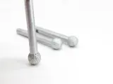 Dinosaw machine showing Balanced geometry reduces chatter and rough walls, so sanding and touch-up drop after engraving.