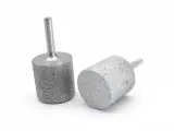 Dinosaw machine showing Optimized diamond density keeps bite longer, improving consistency and reducing tool changes.