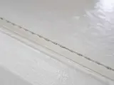 Dinosaw machine showing Each diamond wire processes up to 10,000 meters with reduced breakage risk