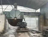 Dinosaw machine showing Robust bridge design with anti-deformation framework ensures consistent precision during operations.