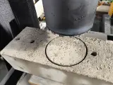 Dinosaw machine showing Stable design creates precise round holes with exact dimensions, reducing material stress.
