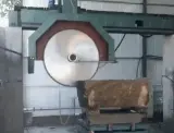 Dinosaw machine showing PLC controls reduce labor needs by 60% while minimizing material waste