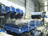 Dinosaw machine showing 30-35m³ daily output with dual-machine system. Continuous operation maximizes production capacity