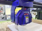 Dinosaw Machine zeigt: Hochpräzise Spindel mit DDX-System optimiert Schnittwege für höchste Genauigkeit.